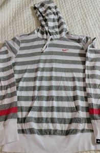 Women's Nike long sleeve hooded shirt.